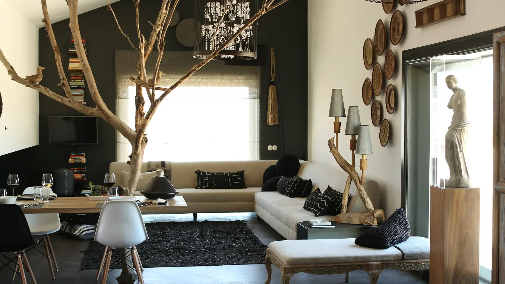 A spacious suite with a living/dining area, kitchenette, mezzanine with a single bed, 1 adjoining bedroom and a private pool.  The suite has an area of 84 sqm and can accommodate 2 adults and 2 children as well as a third adult in an extra bed.